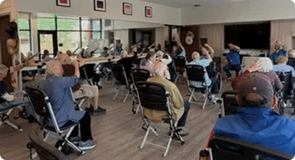 Seniors participating in a group exercise class